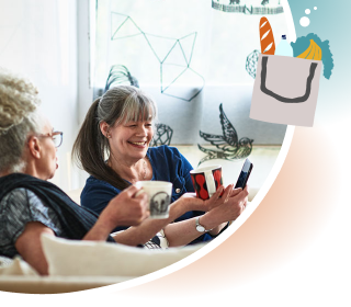 Two women drinking coffee and chatting