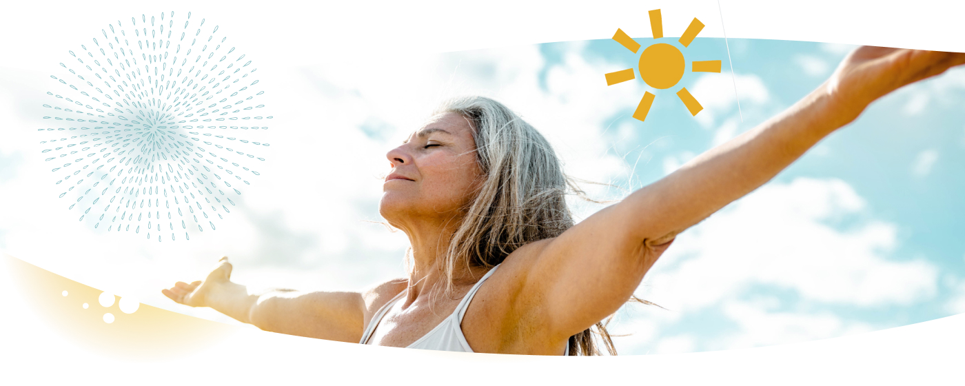 Woman meditating with her arms stretched out